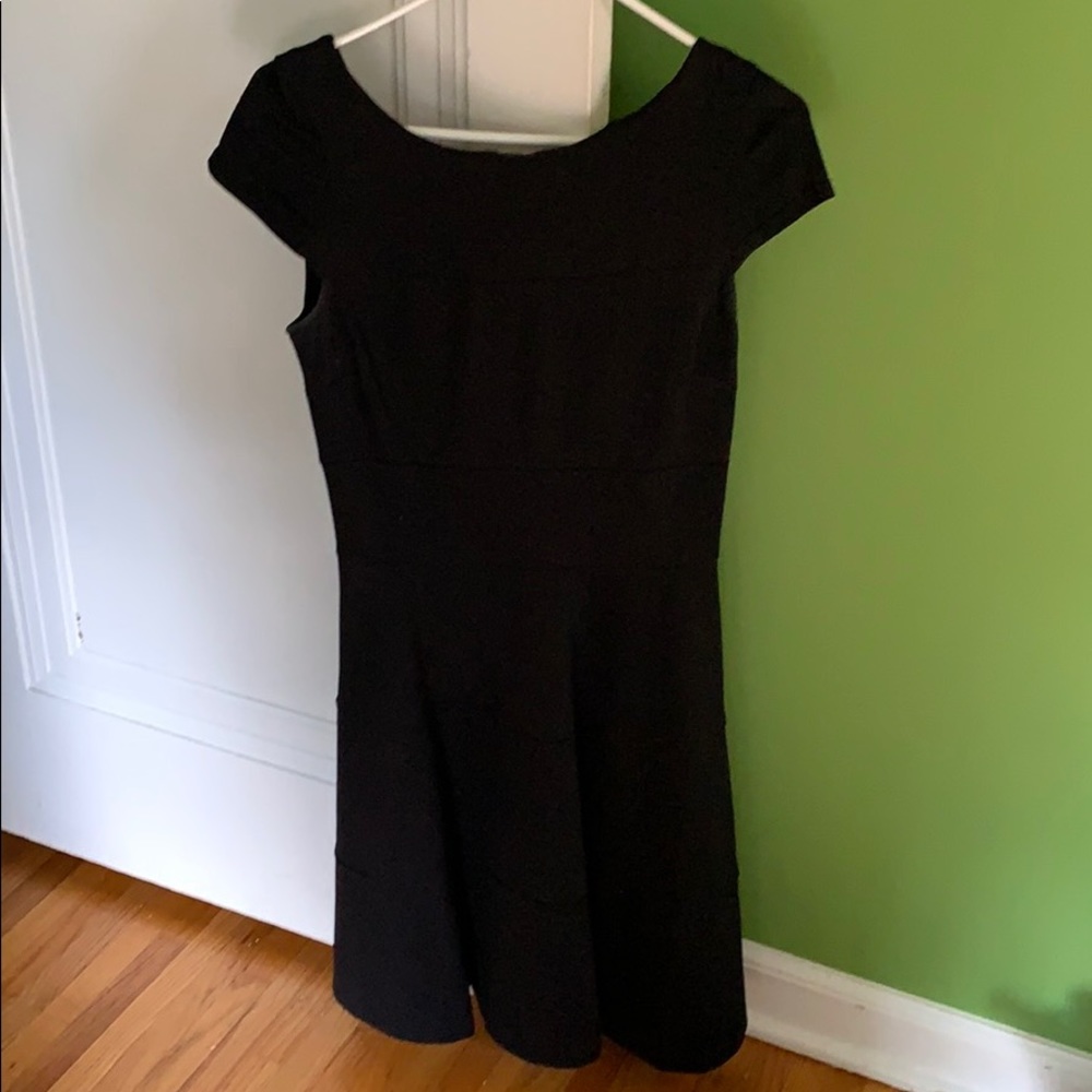 Short black dress with cap sleeves